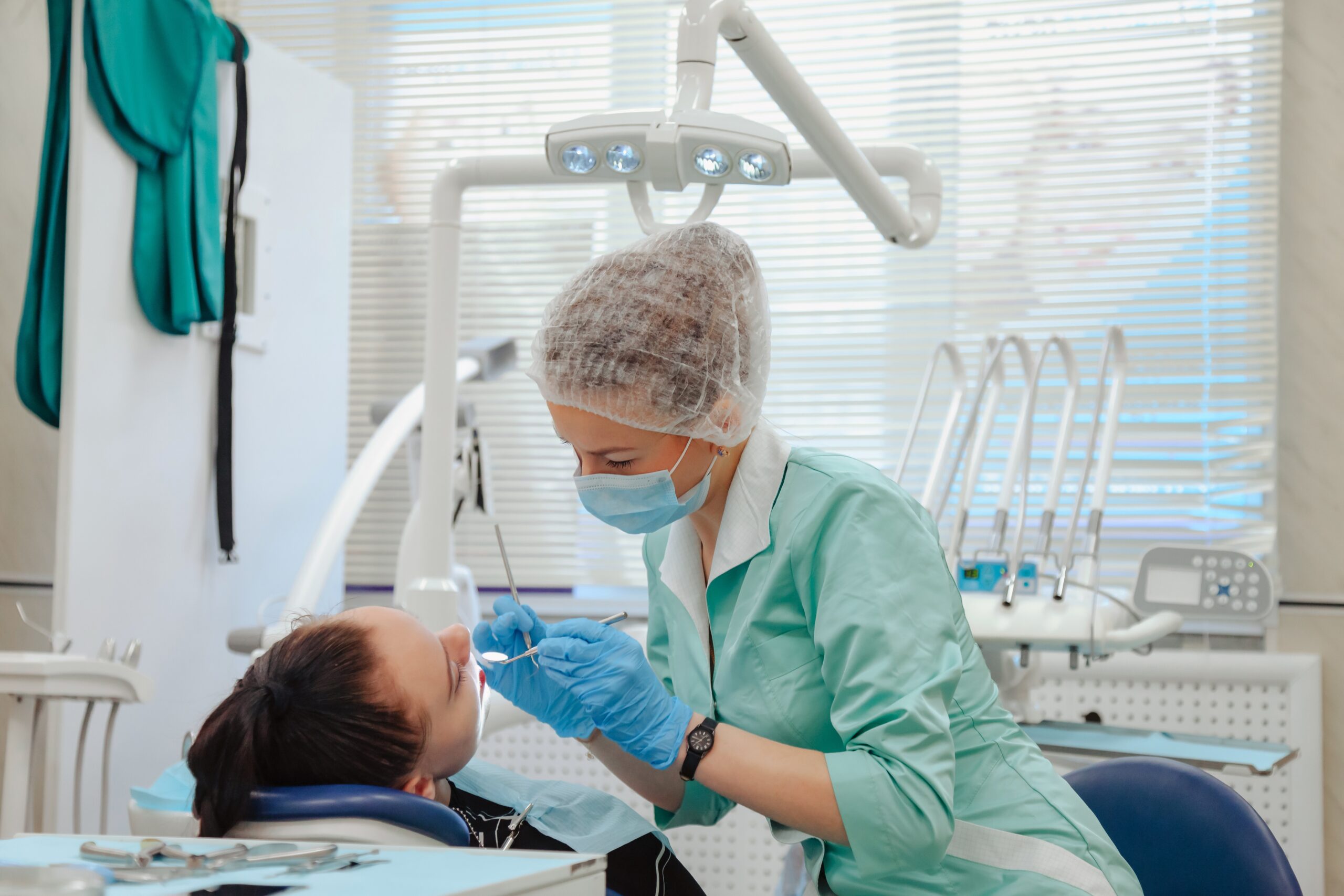 the-dentist-performs-a-dental-examination-in-the-p-2025-03-18-17-13-16-utc